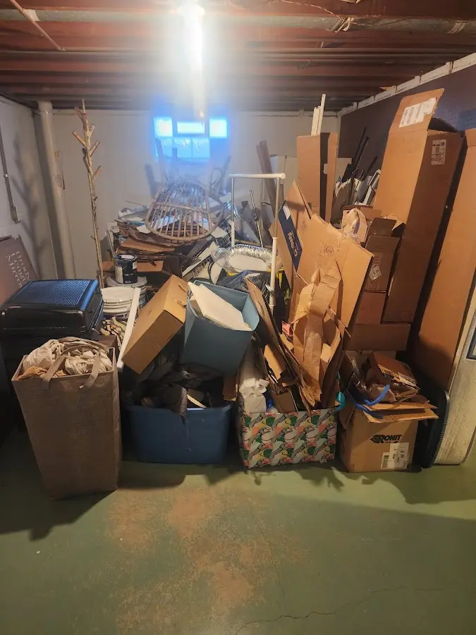 Roll-off dumpster container at job site for Concrete Dumpster Rental in Mineola